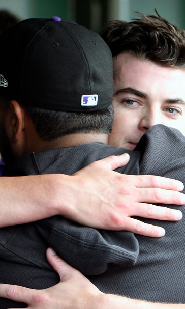 Lambert sparkles to win debut, Rockies top Cubs 3-1